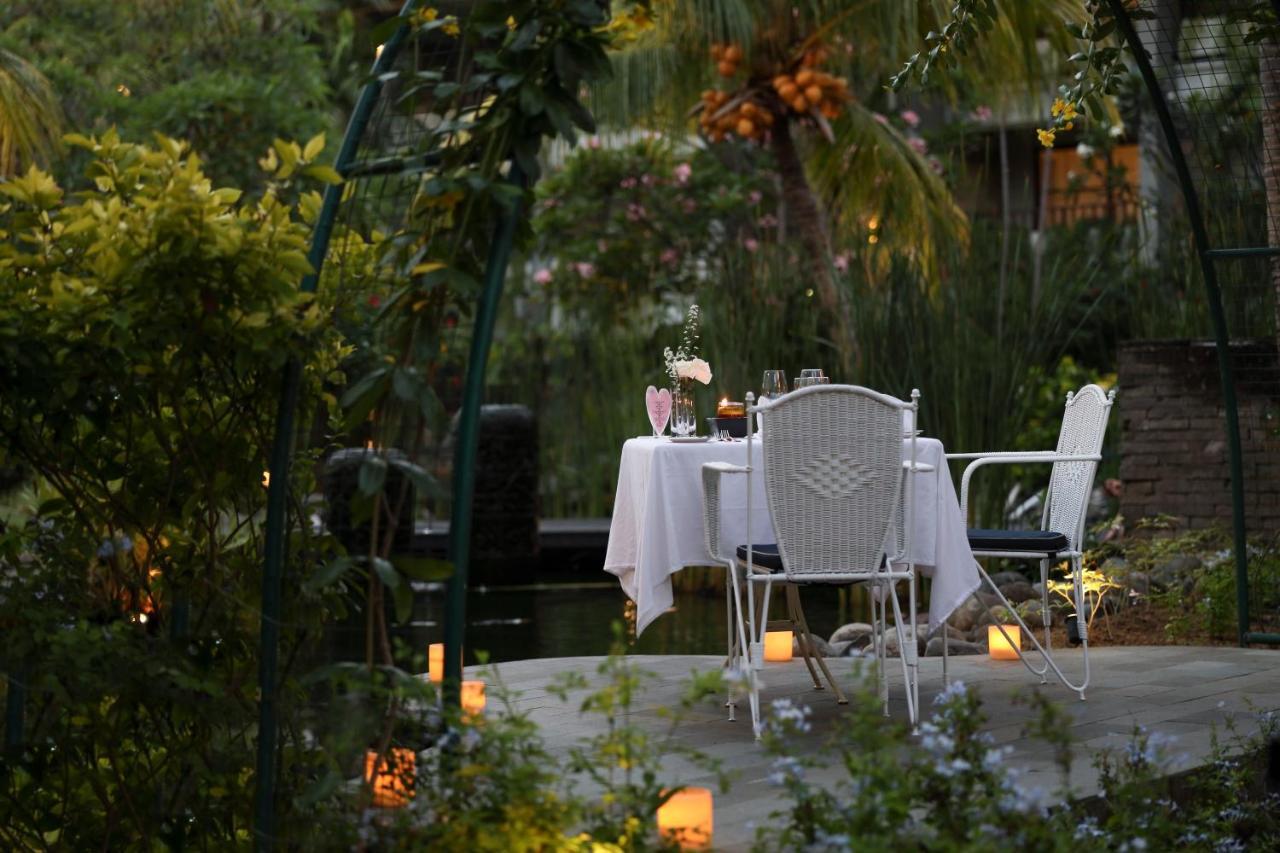 Bali Dynasty Resort Kuta Lombok Exterior foto The garden at the hotel
